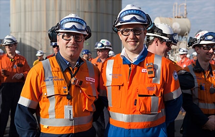 Workers standing together